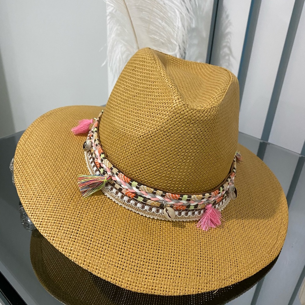 Brown straw fedora hat.